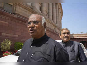New Delhi: Congress MPs Mallikarjun Kharge and Pramod Tiwari at Parliament House...