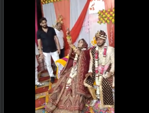 screengrab from twitter video (Wife shoots gun at wedding)
