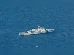 FILE PHOTO_ Philippine Coast Guard flyby over the South China Sea