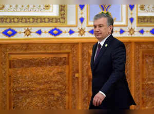 (FILES) In this file photo taken on June 15, 2019 Uzbek President Shavkat Mirziyoyev walks to attend the Conference on Interaction and Confidence-Building Measures in Asia (CICA) in Dushanbe. A constitutional referendum set for late April in Uzbekistan will include a proposal to allow the nation's president, Shavkat Mirziyoyev, to run for another term in office, authorities announced on March 15, 2023. The proposed new constitution, which would amend two-thirds of the current basic law, will be put to a vote on April 30 in Central Asia's most populous country, home to some 35 million people. The autocratic Mirziyoyev, who