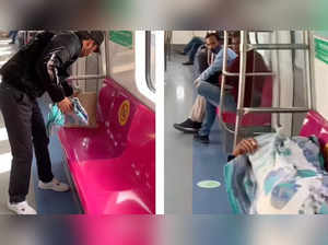 Man sleeps on makeshift bed inside metro. Watch video here