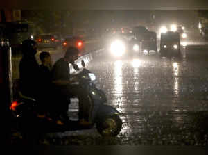 Mumbai: Vehicles ply on the Western Express Highway amid rains at Andheri in Mum...
