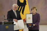 Angela Merkel decorated with highest German honor