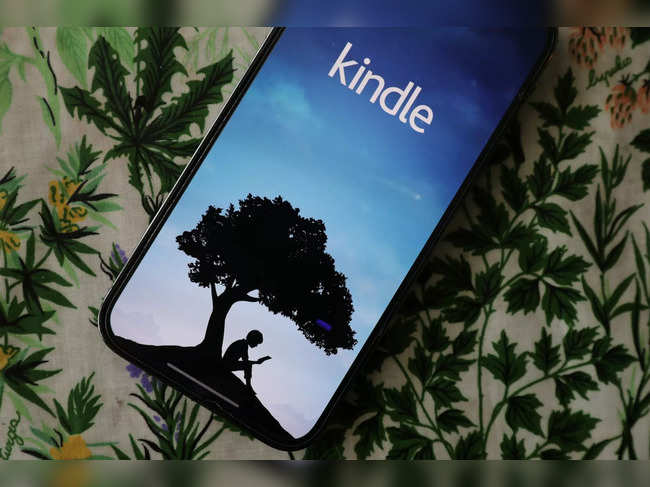 Amazon's Kindle e-book app is seen on an iPhone in an illustration
