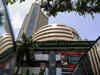 Sensex trades flat, Nifty below 17,650; SCI surges 7%
