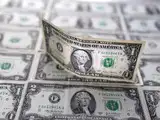 Dollar firms as U.S. yields rise, high British inflation underpins pound