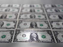 Dollar holds gains on U.S. bank results, kiwi slides on CPI data