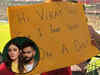 'Hi Virat uncle, can I ... ' Little boy's placard for Kohli requesting a date with his daughter Vamika sparks Twitter outrage