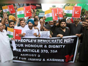 Jammu, Aug 05 (ANI): People's Democratic Party (PDP) supporters holding placards...