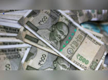 Rupee's opening uptick runs into worries over risk view, premiums rise
