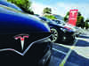 After 4 US price cuts, Tesla raises cost for older models