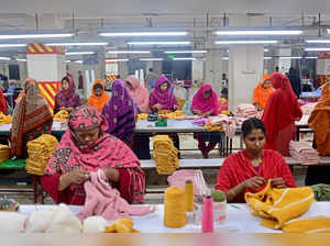 In this photograph taken on April 13, 2023, women work at a garment factory in Savar, on the outskirts of Dhaka. The tenth anniversary of the Rana Plaza garment building collapse will be marked on April 24, a catastrophe that spotlighted the global fashion industry's reliance on developing world labour, working in dangerous and sometimes deadly conditions.  - To go with 'BANGLADESH-ACCIDENT-LABOUR-TEXTILE,FOCUS' by Shafiqul ALAM (Photo by Munir uz ZAMAN / AFP) / To go with 'BANGLADESH-ACCIDENT-LABOUR-TEXTILE,FOCUS' by Shafiqul ALAM
