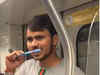 Video of a man brushing his teeth inside a Delhi Metro train goes viral