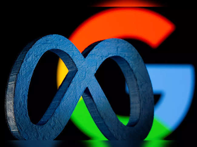 A 3D printed Facebook's new rebrand logo Meta is seen in front of displayed Google logo in this illustration