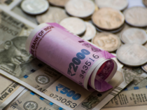 Rupee gains 21 paise to close at 81.74 against US dollar