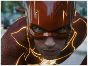 In new trailer, The Flash travels back in time, meets Batman and Supergirl. Watch video