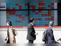 Japan's Nikkei hits 8-month high after BOJ keeps stimulus