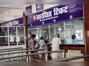 Patna: Passengers busy buying rail tickets from the reservation counter of Patna junction railway station during the fourth phase of the nationwide lockdown imposed to mitigate the spread of coronavirus, on May 23, 2020. (Photo: IANS)