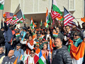 **EDS: TO GO WITH STORY** San Francisco: Indian-Americans gather outside the Con...