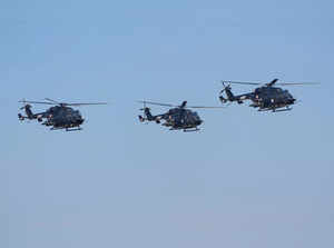 Bengaluru: Indian Army's advanced light helicopters (ALH) fly past during the in...