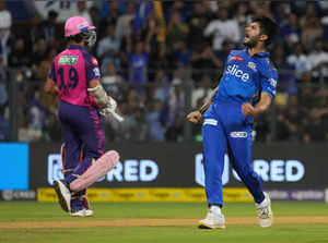 Mumbai: Mumbai Indians bowler Arshad Khan celebrates the wicket of Rajasthan Roy...