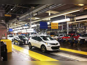 FILE PHOTO: Workers assemble Chevy Bolt EV cars at the General Motors assembly plant in Orion Township