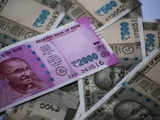 Indian rupee ends lower as investors cover dollar shorts ahead of key rate meetings