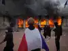 France&rsquo;s protests rage as buildings burn, shops are looted and young protester loses hand; Vance blames immigration:Image