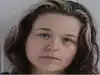 Image for Woman handcuffs son, then watches