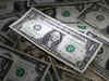 Dollar slips in choppy trading, grapple with cut:Image