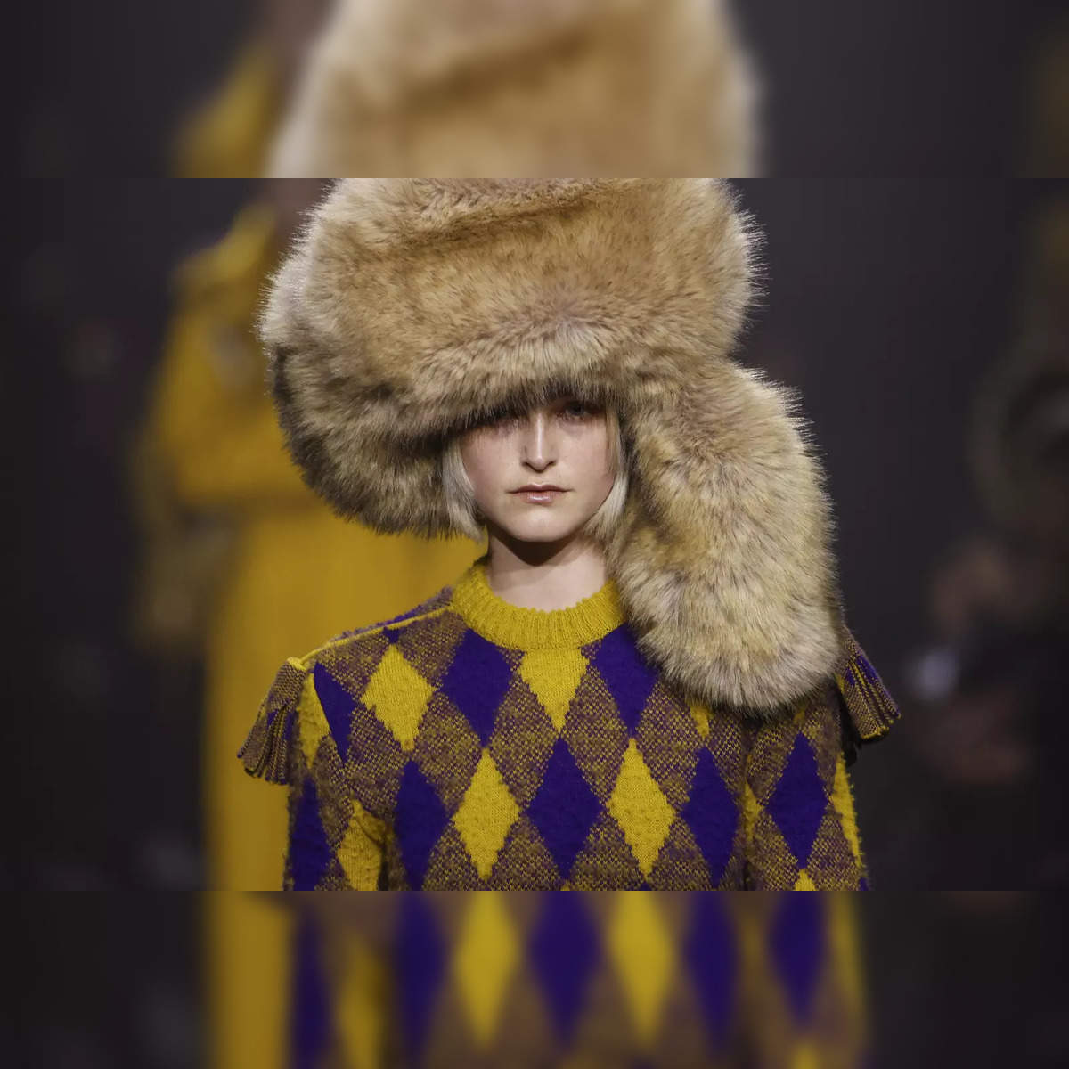 Burberry Coats: Burberry ditch signature trench coats for faux fur, feathers  and duck prints in new catwalk show - The Economic Times