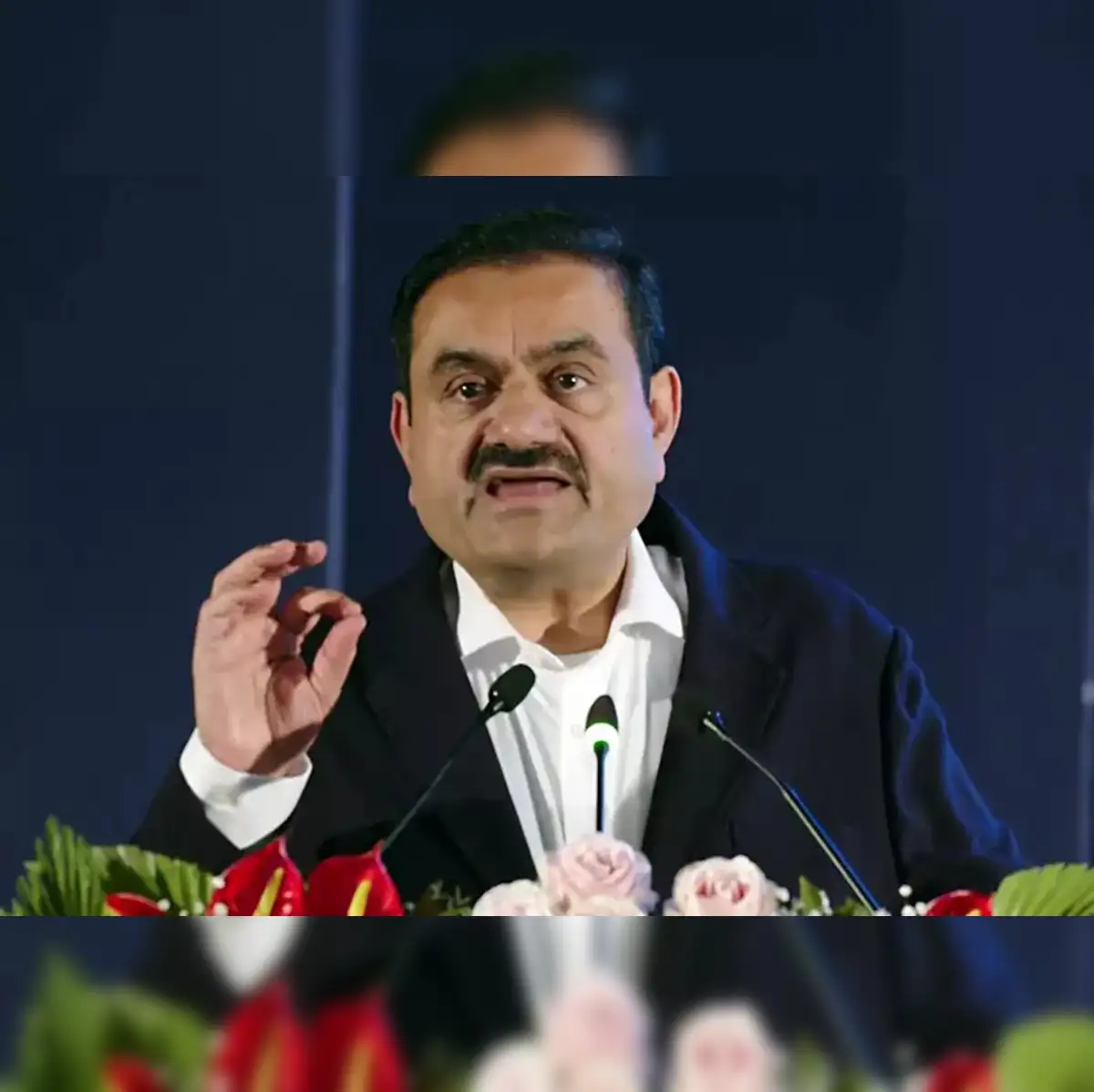 Adani Group firm to swap part of dollar debt with rupee after top rating,  sources say - The Economic Times
