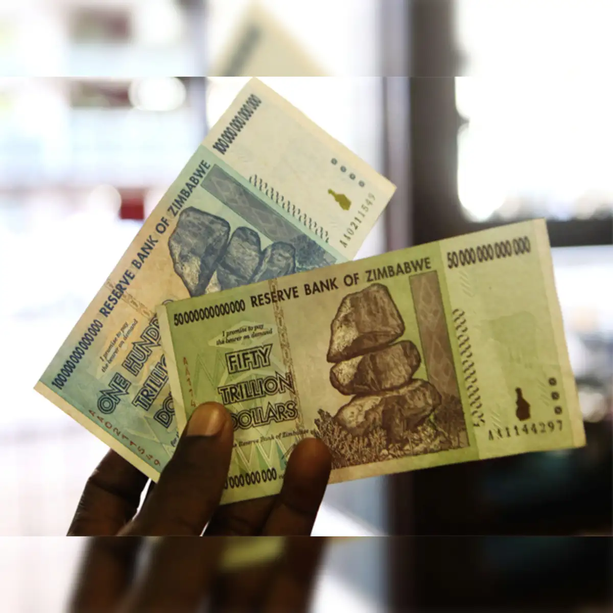 Zimbabwe sees its local currency devalued to $1 = Z$35 quadrillion - The  Economic Times