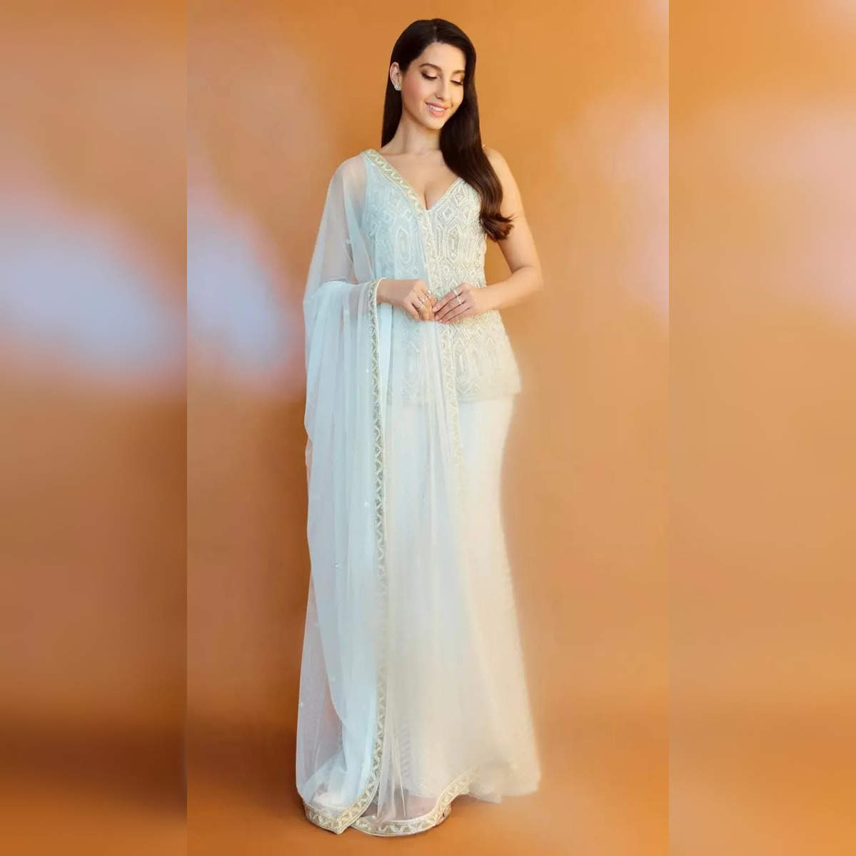 nora fatehi looks like a dream in white ensemble check out stunning photos