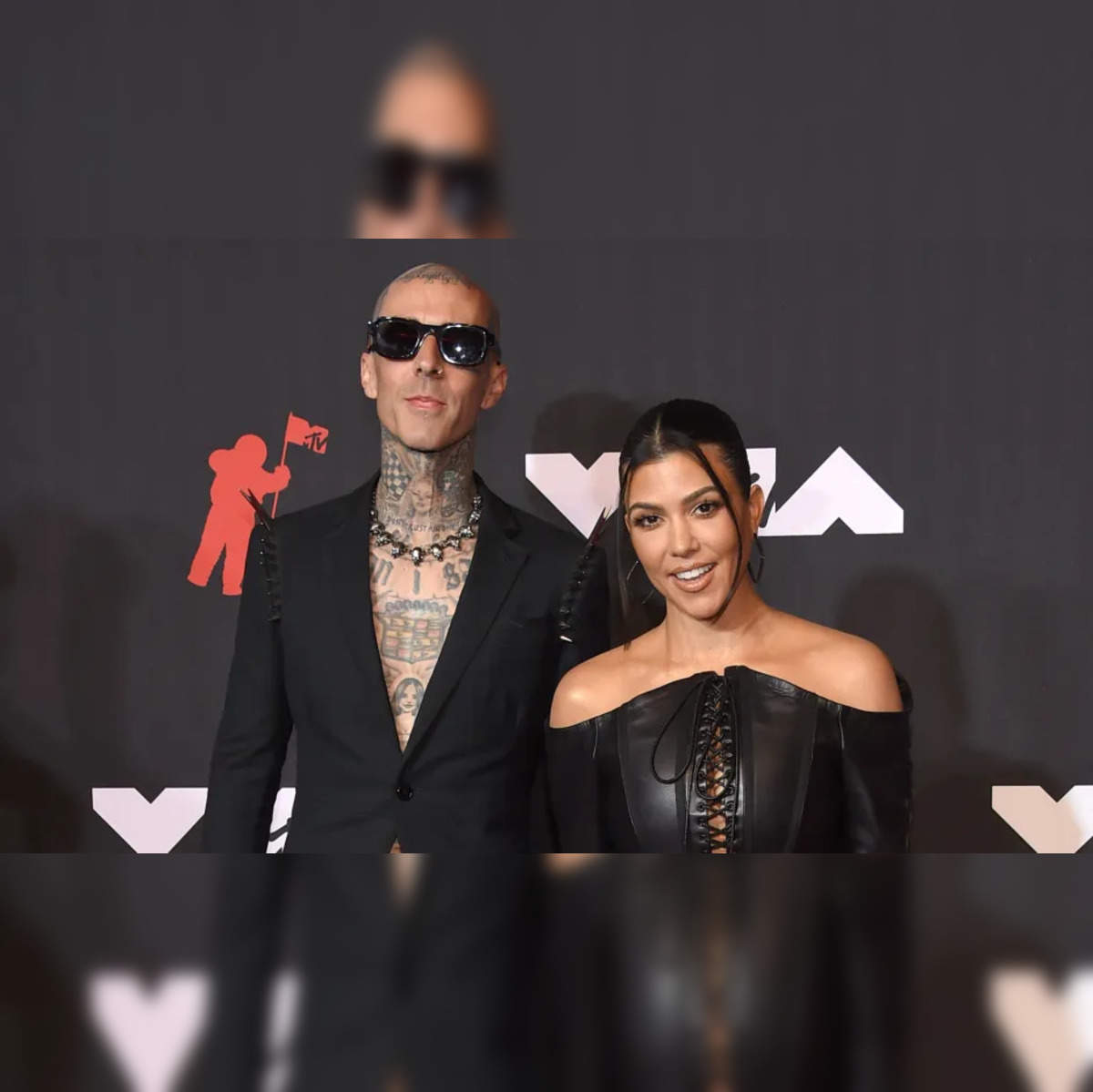 Kourtney Kardashian, Travis Barker seemingly confirm relationship on  Instagram