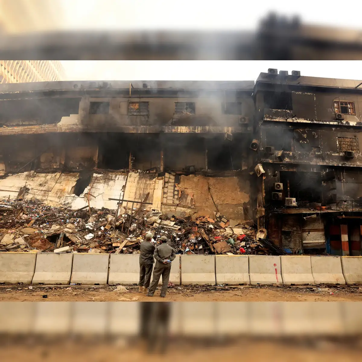 Death toll due to fire in shopping mall in Pak's Karachi rises to 14 - The  Economic Times