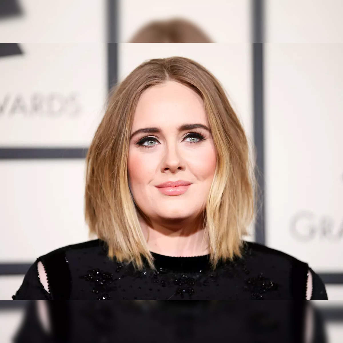 Adele says new album will explain her divorce to her young son