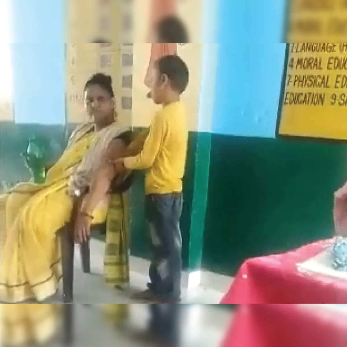 Teacher Massage: Teacher gets student to massage her arm, is suspended:  Viral video - The Economic Times