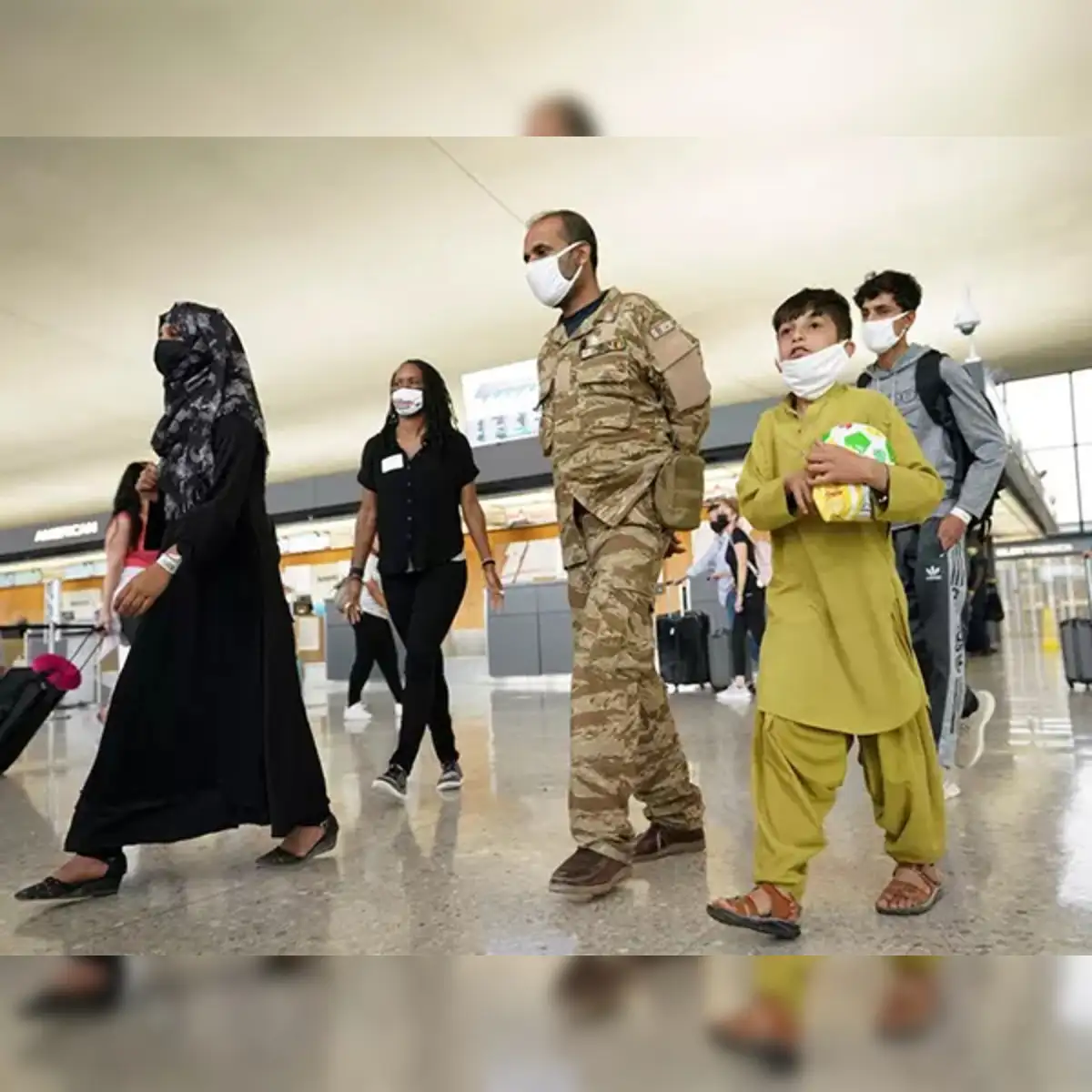 Trump pledged to save Afghans. But UAE already sent some evacuees back,  cable shows - The Economic Times