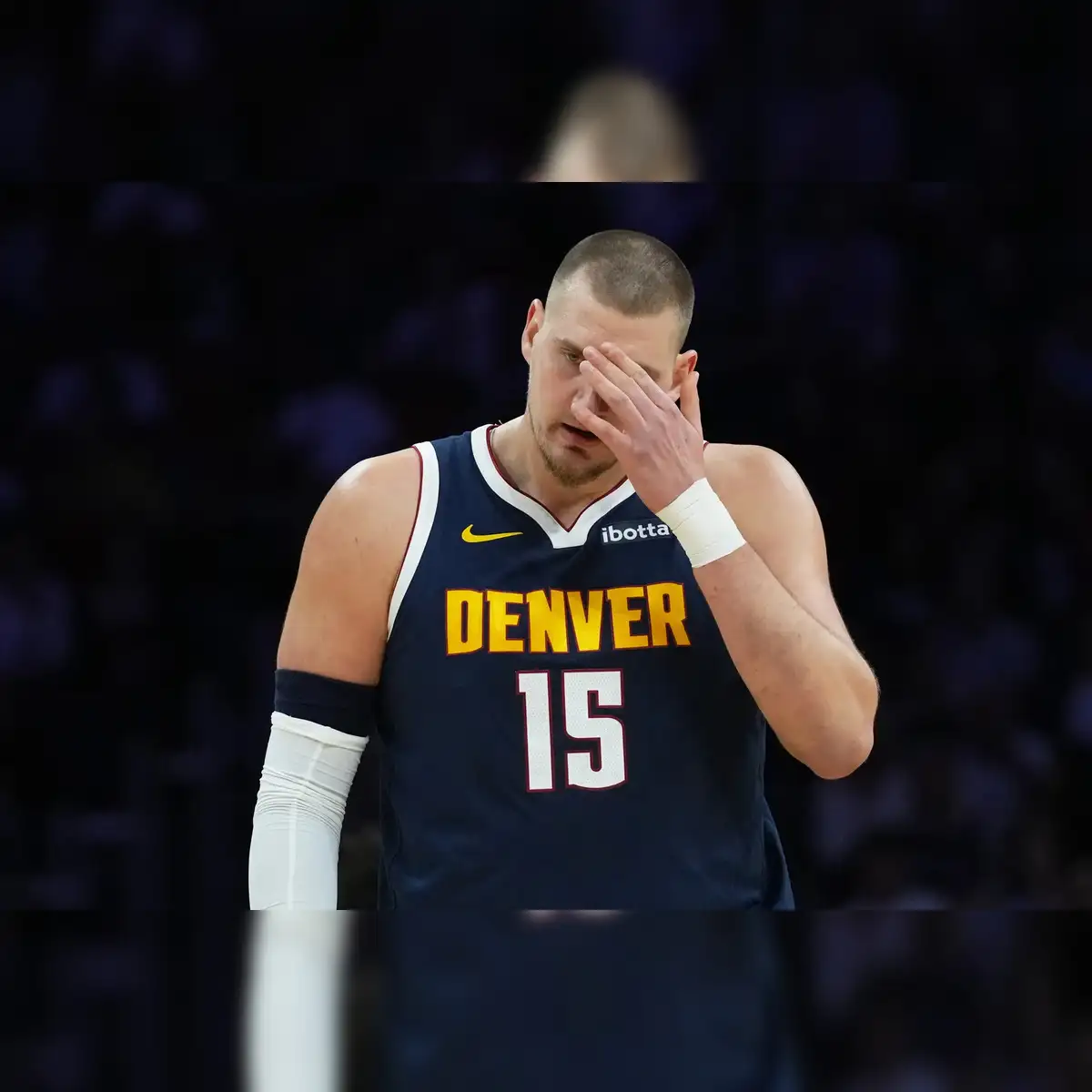 Nikola Jokic injury: Nikola Jokic suffers knee injury as Heat beat Nuggets  147-123 - The Economic Times