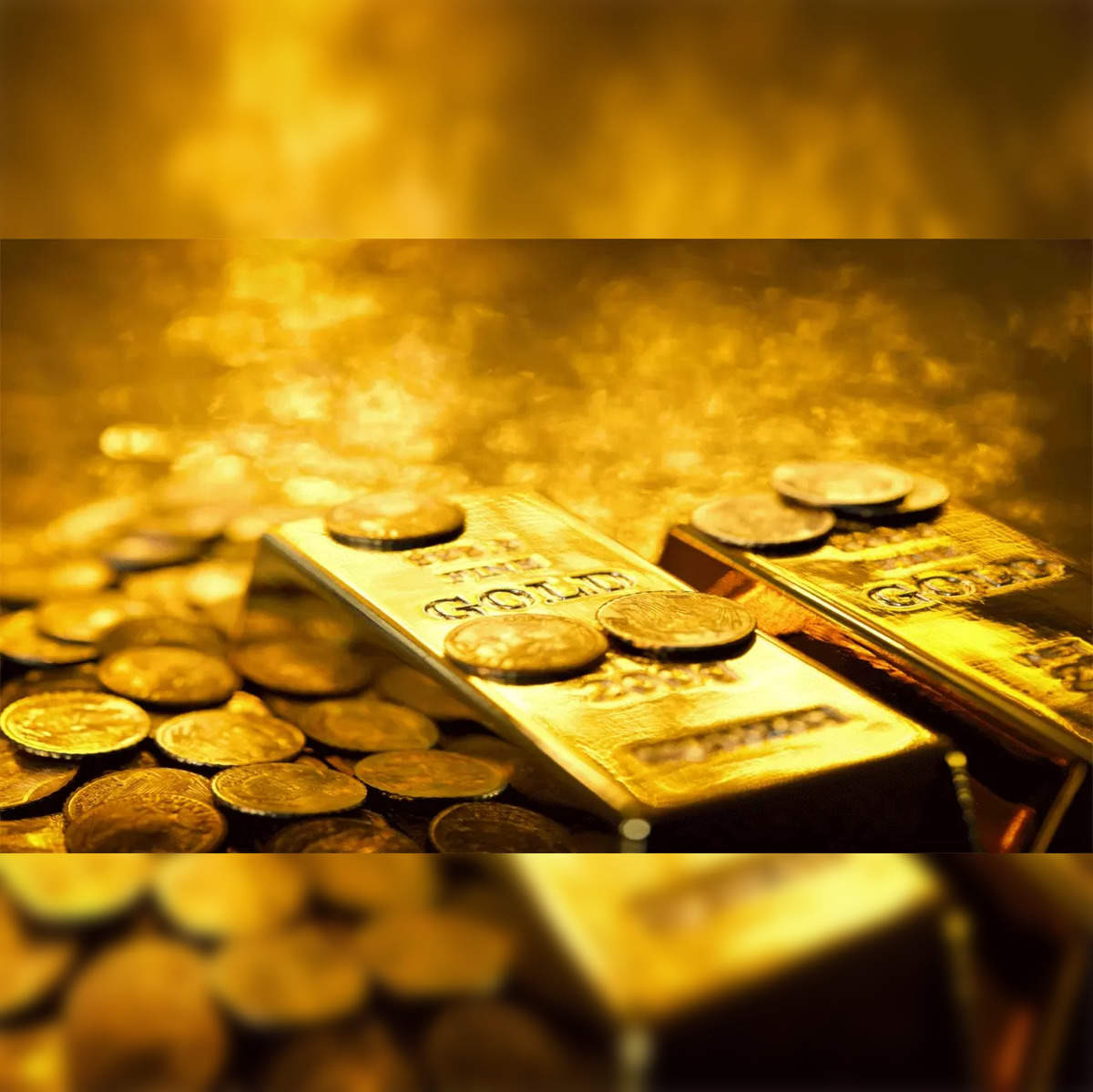 Gold prices edge lower as dollar uptick dampens appeal