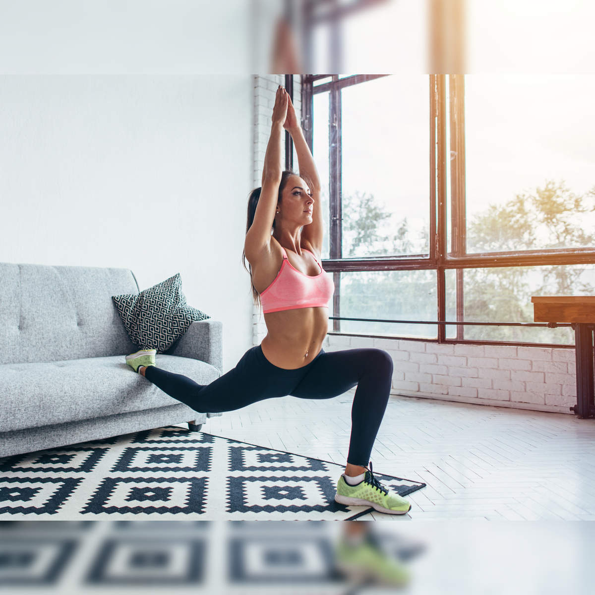Woman exercising pilates. Double leg stretch exercise Stock Photo - Alamy