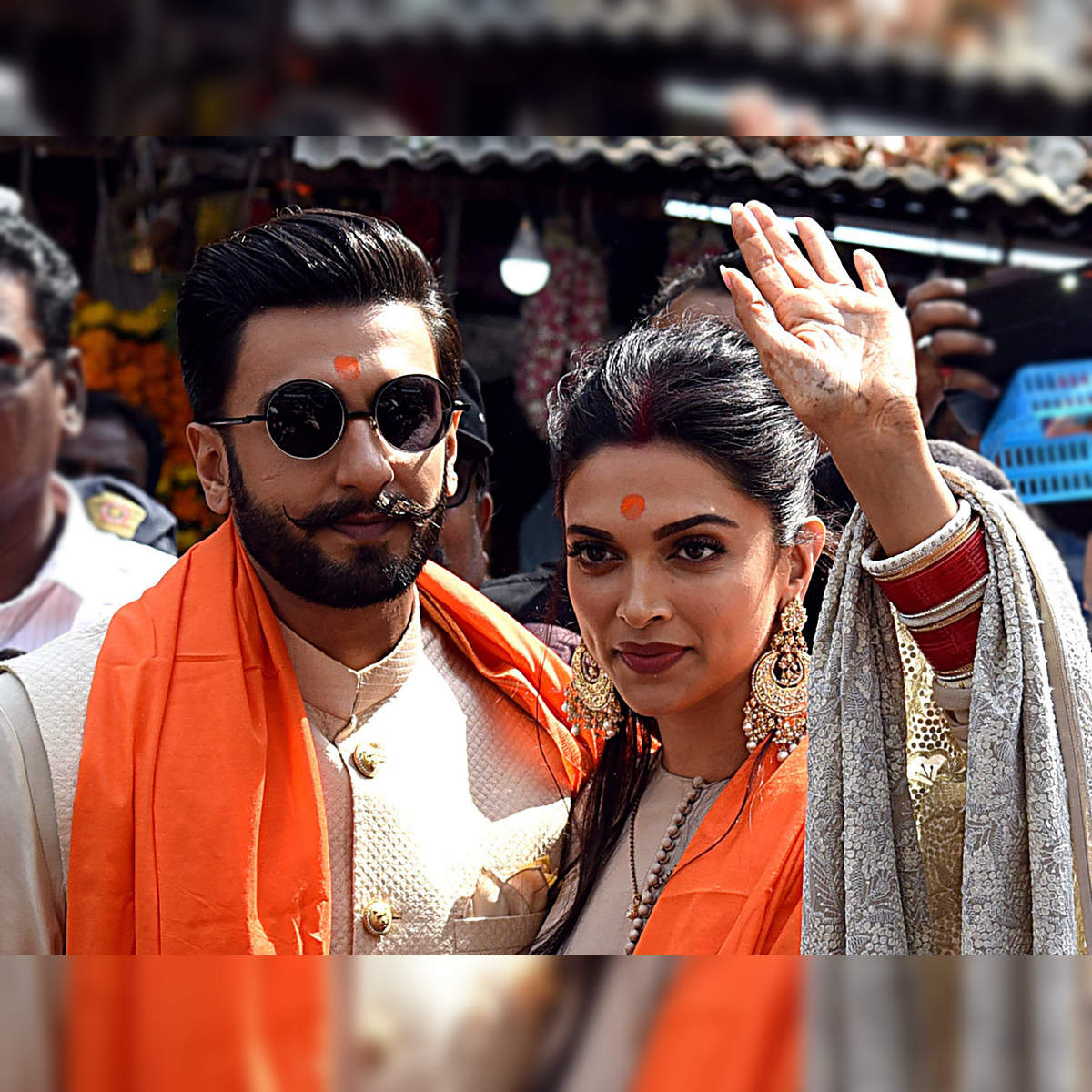 Deepika and Ranveer twinning in pink Sabyasachi outfits at