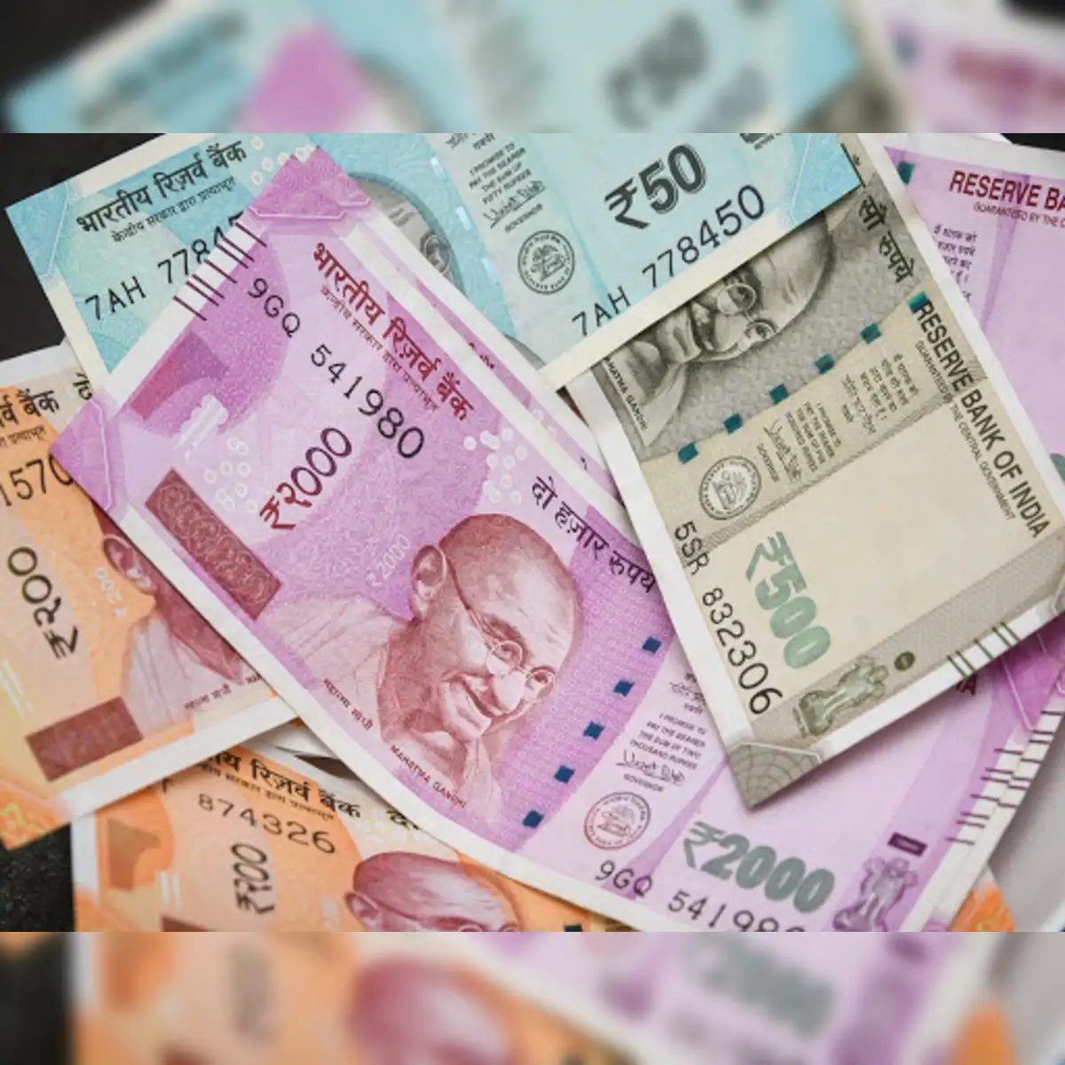 Rupee rises 26 paise to 69 against USD in early trade - The Economic Times