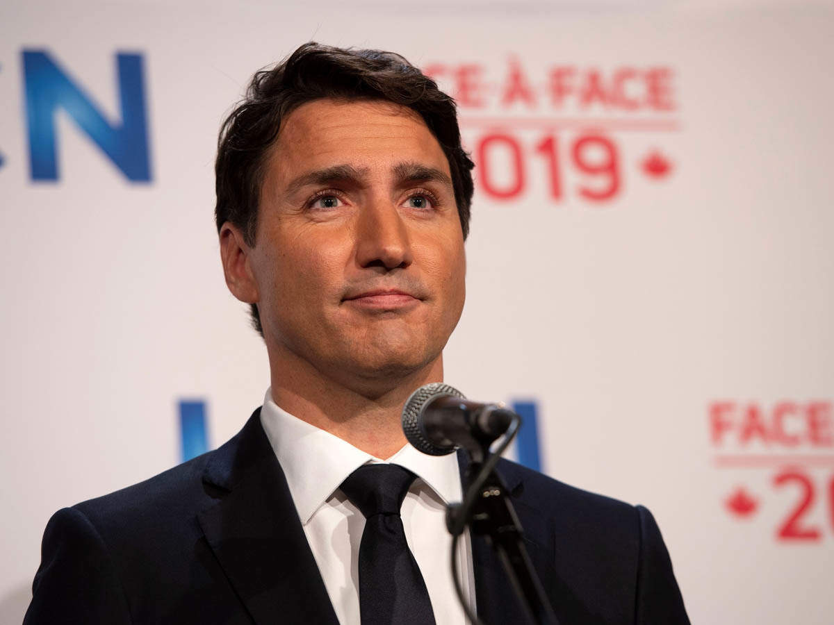 R Pitfalls Grease Justin Trudeau: Justin Trudeau's brownface 'Aladdin' look invites backlash;  but is dressing for fun racially insensitive? - The Economic Times