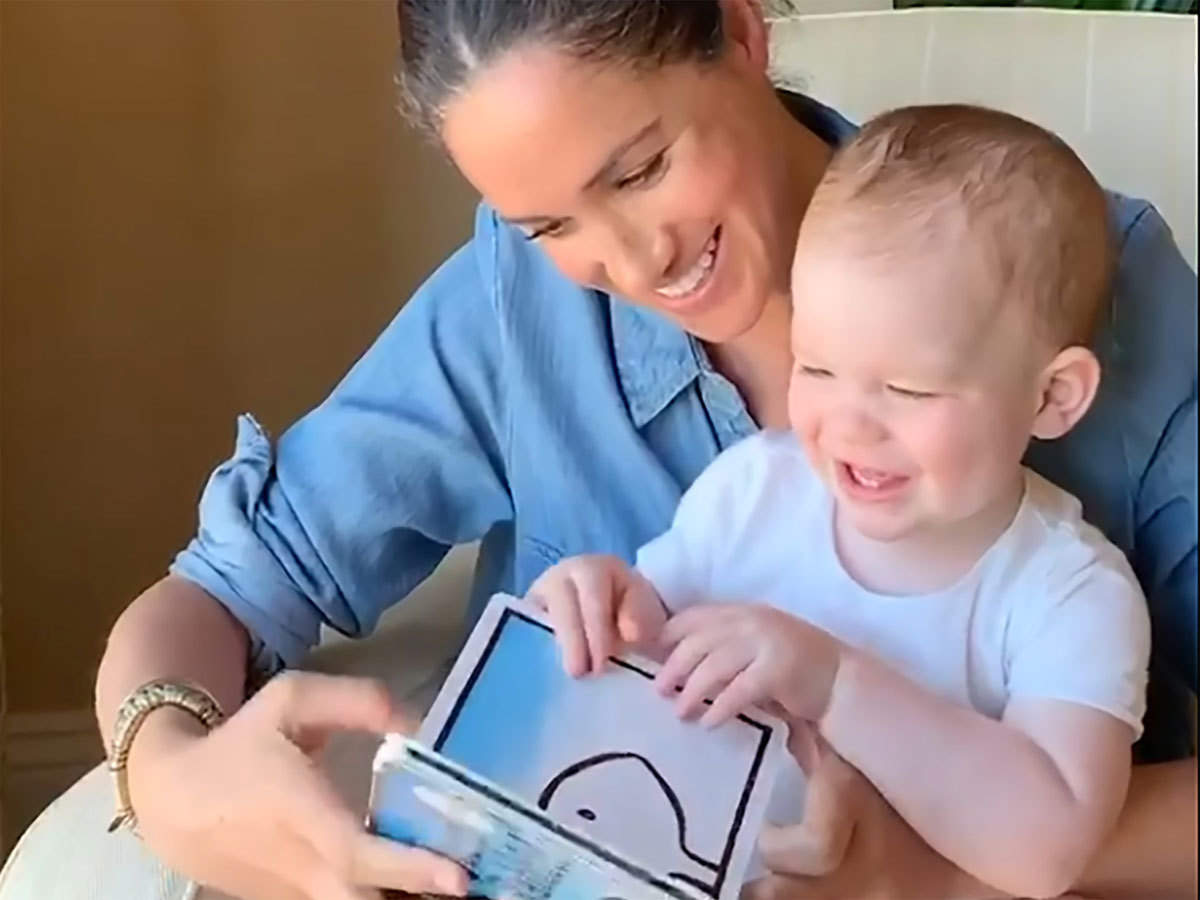 Meghan reads to Archie in video released for his 1st birthday to ...