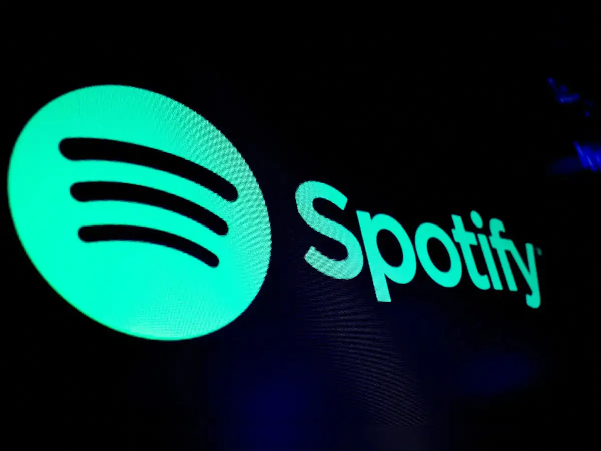 Spotify forecasts profit below estimates on higher taxes, shares sink - The Economic Times