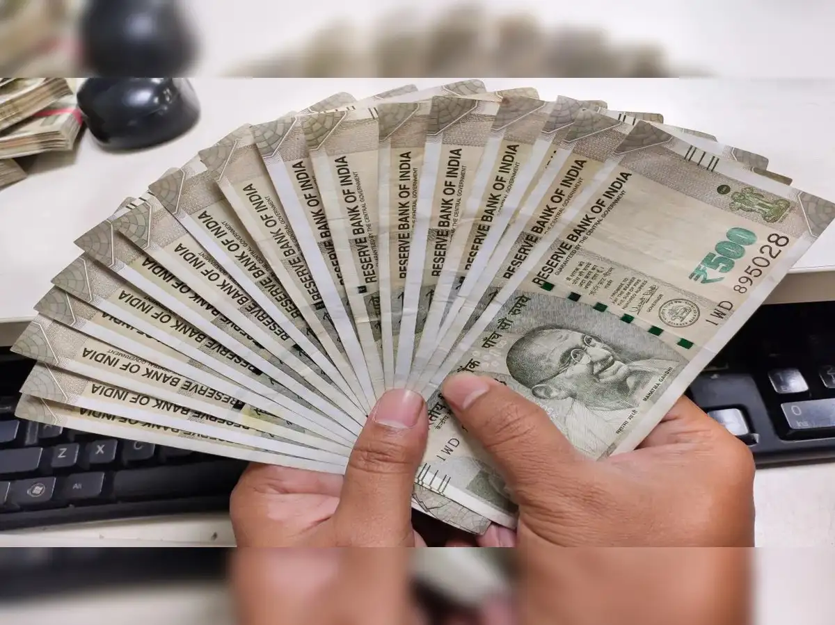 Rupee rises 9 paise to close at 87.93 against US dollar - The Economic Times