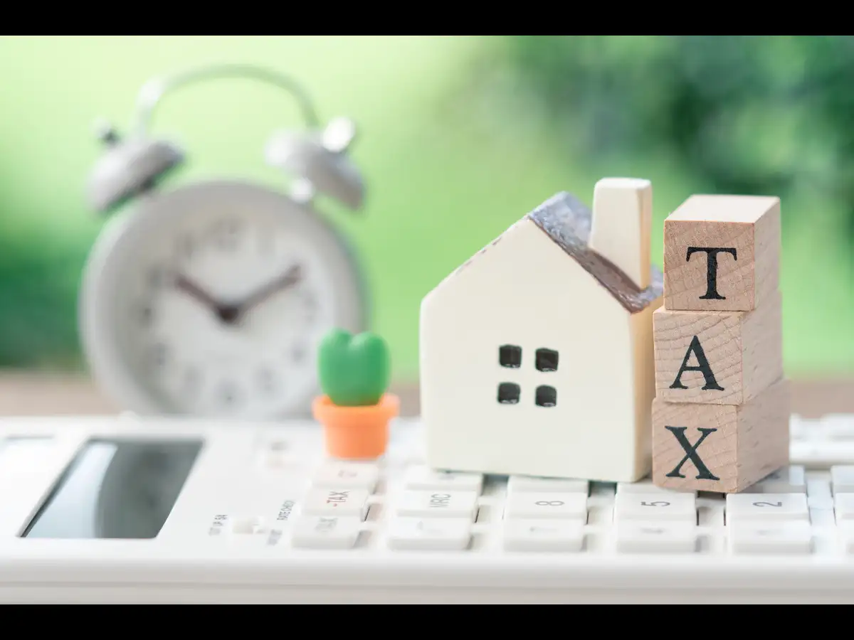 Can me and my wife claim LTCG tax exemption on gains from residential property sold in 2025?
