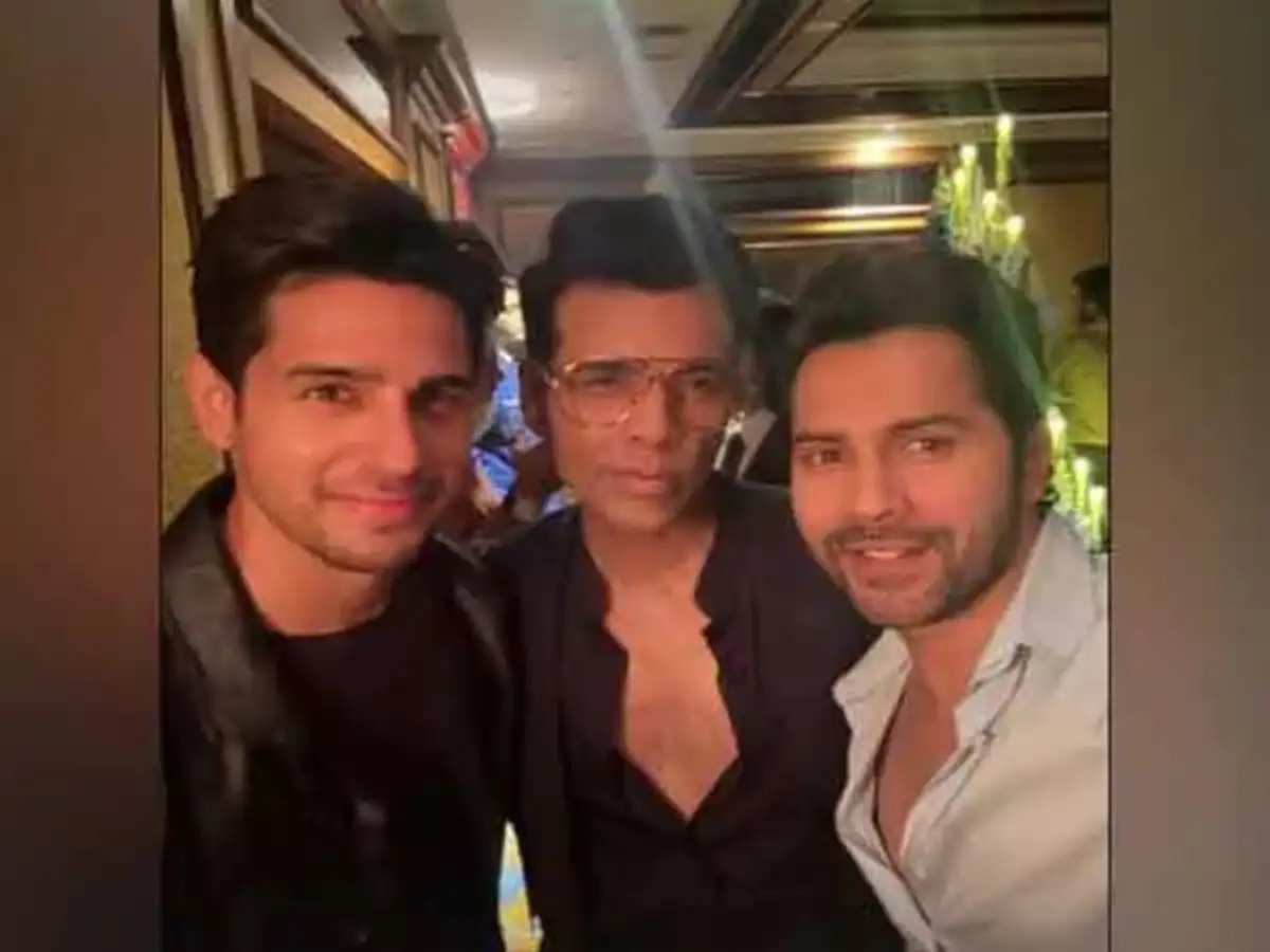 Karan Johar with OG students Sidharth Malhotra, Varun Dhawan - The Economic  Times